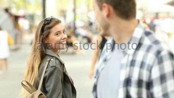 Girls, How do you feel/react when an unknown guy passing by you on a street?