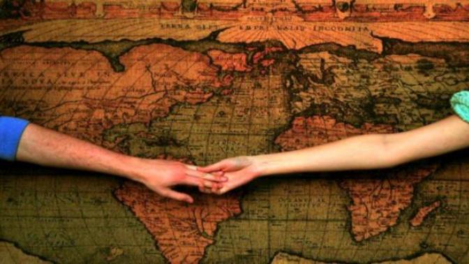 Long Distance girlfriend refuses to post relationship status on Facebook?