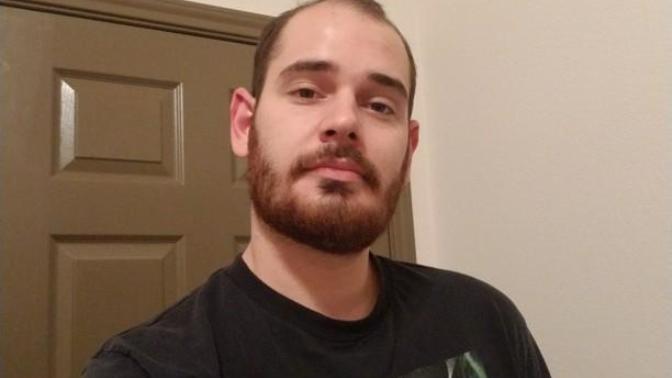 What kind of clothes would look good on a 6' white guy with a great beard and an average build?