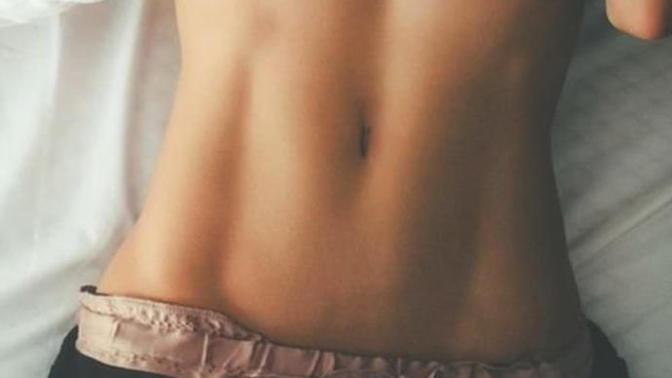 Can a girl get a perfectly flat stomach without working out a ton?