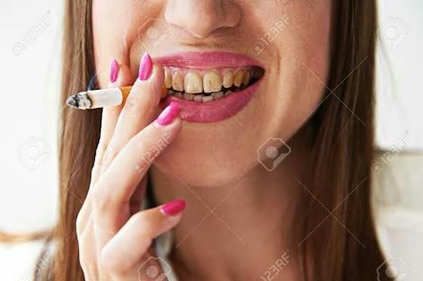 How do movie actors and women in general are able to keep their teeth so white even if they smoke cigarettes??