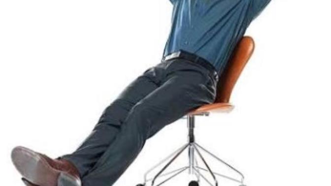 What does it mean when a guy leans/slide back into his chair?