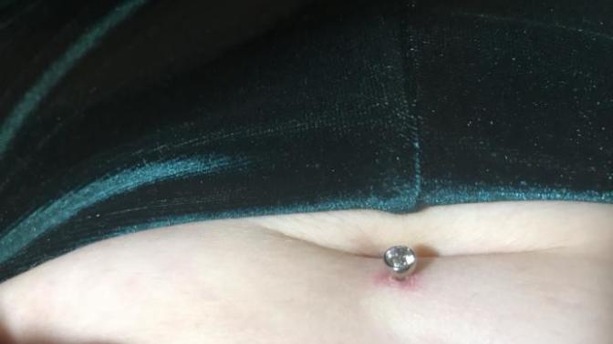 Is my belly button piercing healing or infected?
