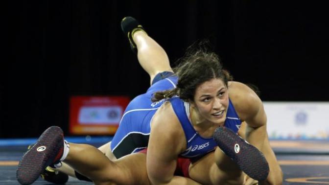 Wrestling as a girl, would I be branded as a slut if I joined?