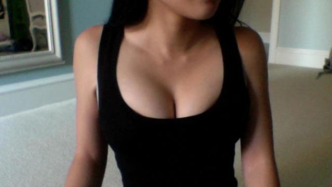 Black or white tank top? Which one looks better (Warning: Don't view if you get offended by cleavage)?