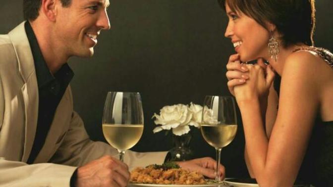 Who puts more effort into the first date, the man or the woman?