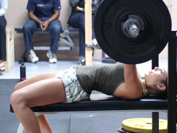Guys would you date a girl who could bench press her own weight and higher??