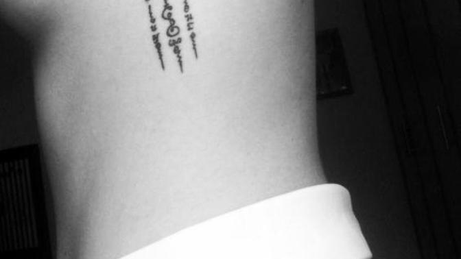 Which tattoo should I get behind my left arm, and where should I get the other?