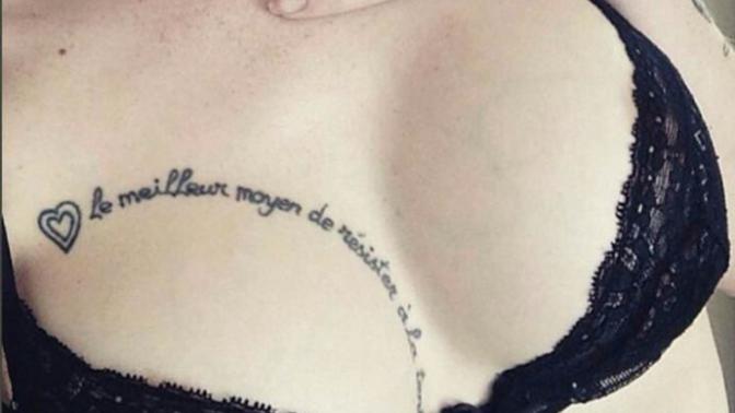 Females, why breast tattoos?