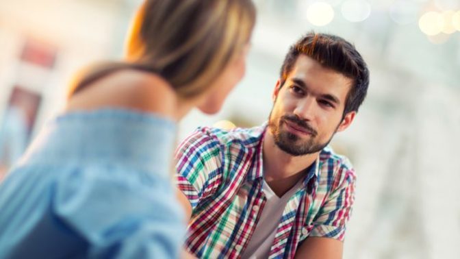 If a guys face lights up when he notices you, what does that mean?