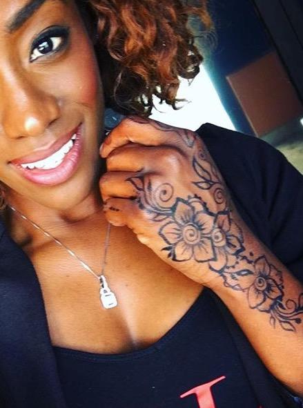 Not that I have any, but out of curiosity... What do you think of tattoo's on dark skinned black girls?
