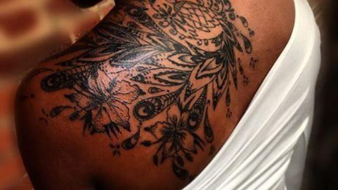 Not that I have any, but out of curiosity... What do you think of tattoo's on dark skinned black girls?
