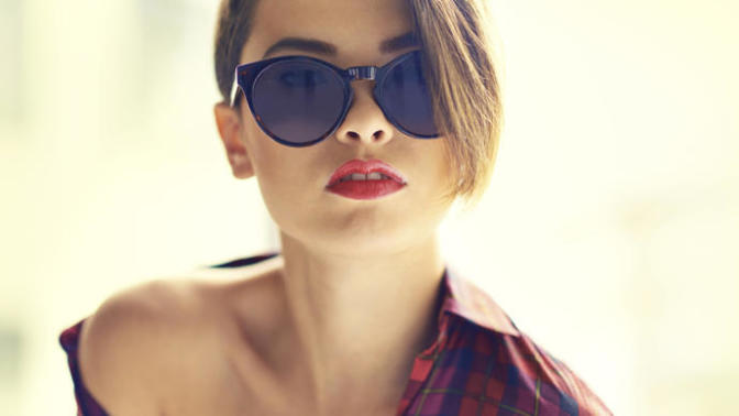 Guys, is a lady wearing sunglasses making her look less approachable?