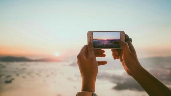 Do you primarily use your camera or phone to take photographs?