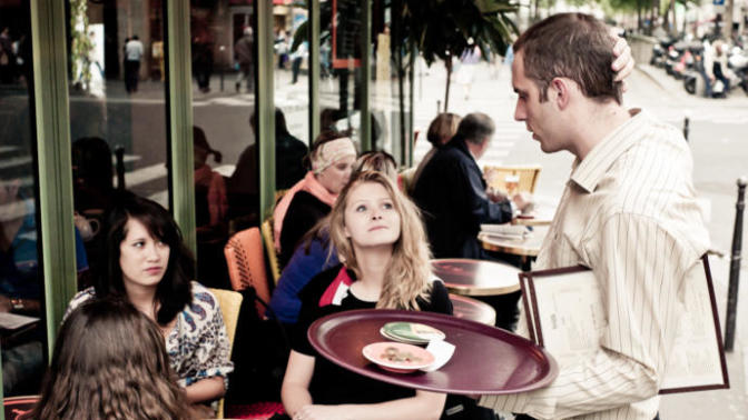 Should I report a waiter to the manager for charging his own tip on my bill?