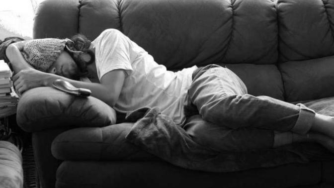 Why does my boyfriend leave bed to sleep on the couch?