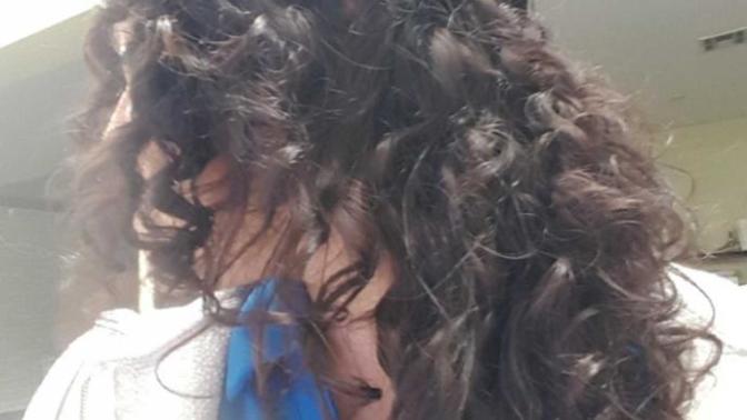 Is curly hair unattractive?