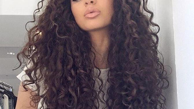 Guys, what do you think of naturally curly hair on women? Do you find it attractive?