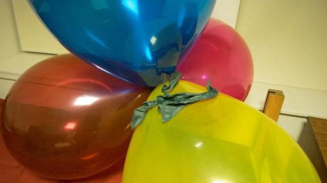 How should I deal with my boyfriend having balloons all around the room?