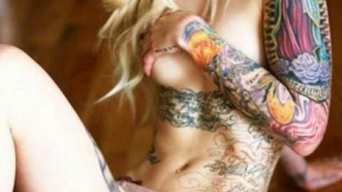 Women with tattoos. Are they attractive or unattractive?