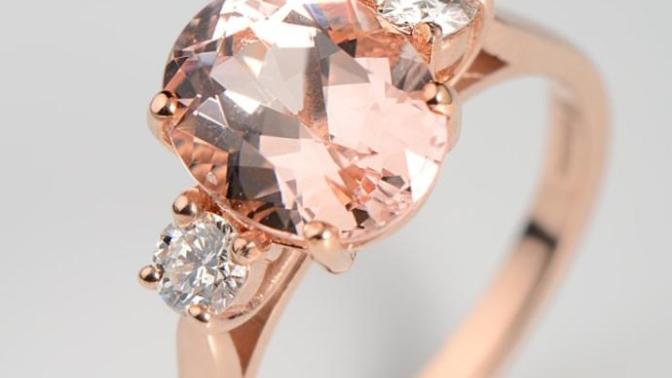 Girls, What do you think of this engagement ring? It's morganite in the middle and diamonds on the sides. My girlfriend likes morganite? opinion?