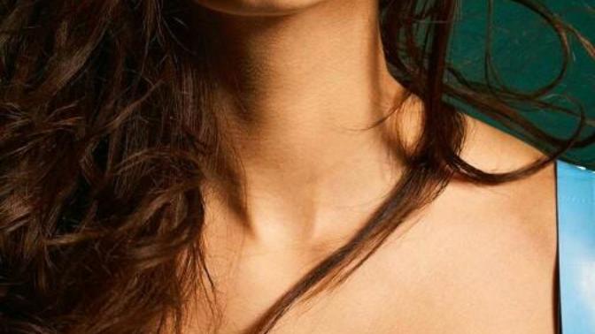 Does a woman need implants to make her look like a real model?