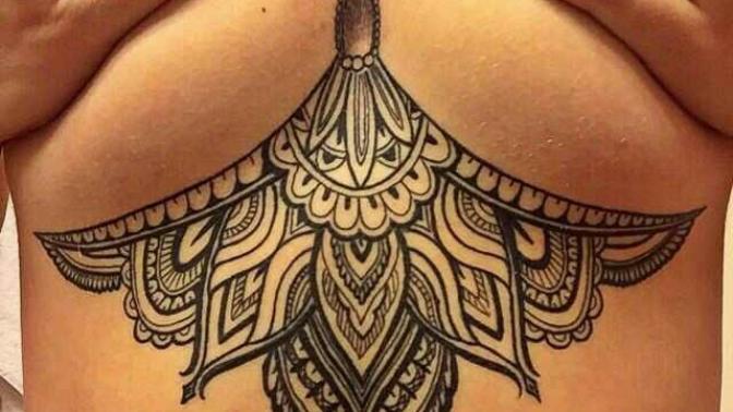 Do you like this below breast tattoo? Pic below?