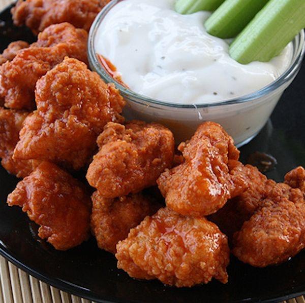 Chicken wings question!  Overall, do u prefer bone-in chicken wings or boneless chicken wings?