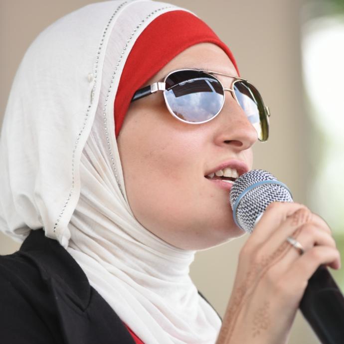 Which one of these two is qualified to lead a women's march?