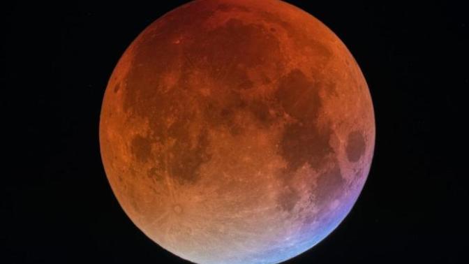 Is anyone here watching the super blue blood moon?