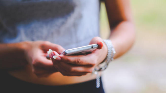If a girl texts a guy first, does that make her seem needy and desperate?