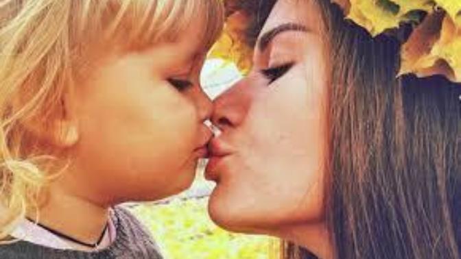 Is it okay for parents to kiss their children on the lips?