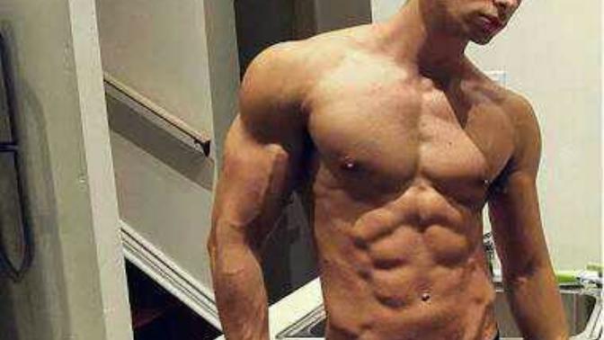 How do people react when there's a tall muscular guy in the room?