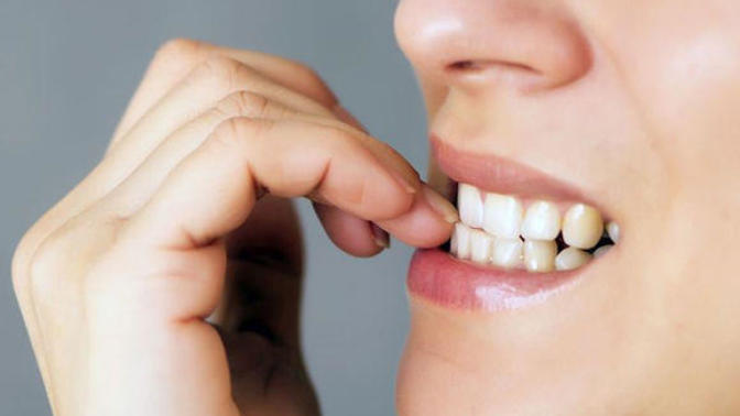 How can I stop biting my nails?