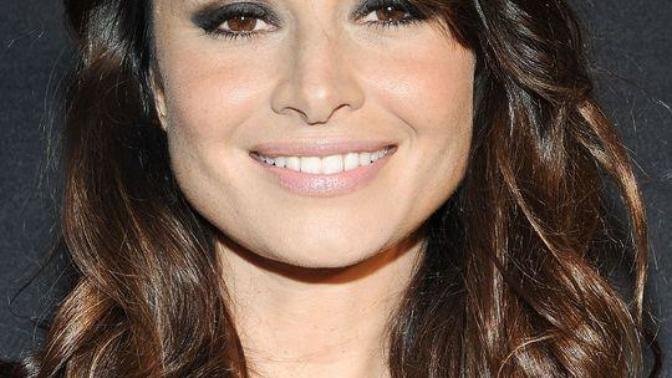 Guys, what's your opinion of girls with smokey black eyeshadow and side swept bangs?