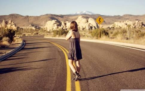Is it safe or wise for a woman to hitchhike alone?