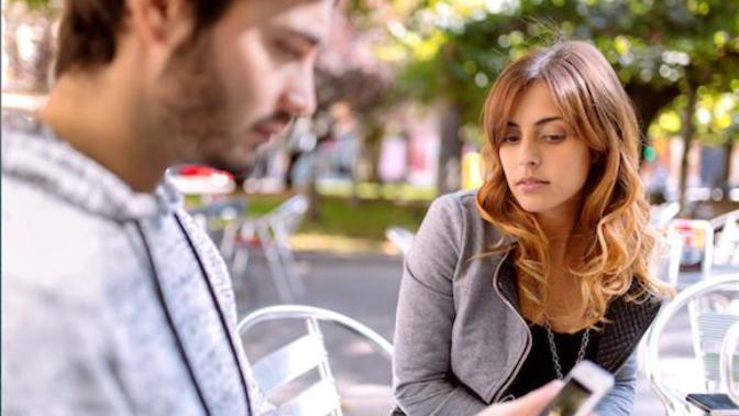 Is it "wrong" to look or glance at your partner's phone screen when he/she is texting while being with you?