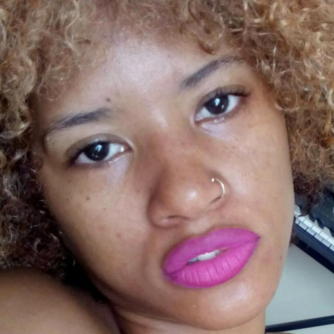 Why do black women wear blonde wigs?