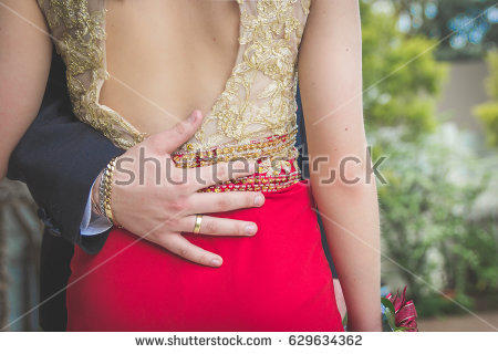 Do you think it’s weird when a man places his hand on your lower back? 
