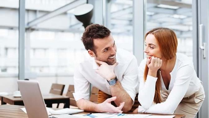 How can I flirt with a guy at work?