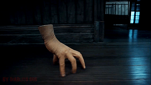 You walk around in your residence one day when suddenly you see a disembodied hand just crawling around on your floor. What do you do?