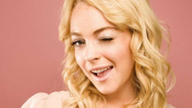 If a woman would wink at you, you would interpret her gesture as?