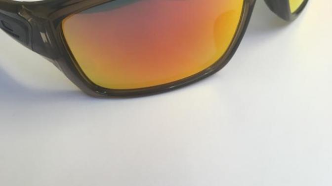 Red mirrored sunglasses or brown lenses? Which is more attractive on a man?
