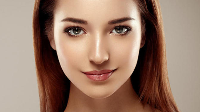 How heavily edited would you say the photo of this woman is?