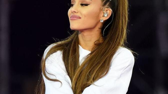 Why do some people think Ariana grande is attractive when she is very short ?