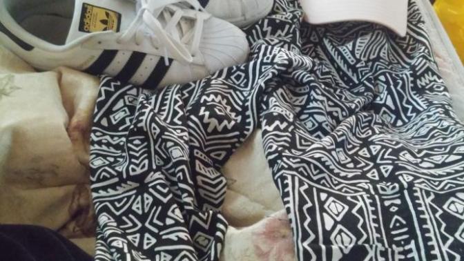 What shirt could I wear with these pants/shoes/hat?