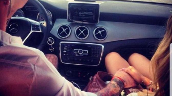 Why does my boyfriend put his hand on my thigh while driving?