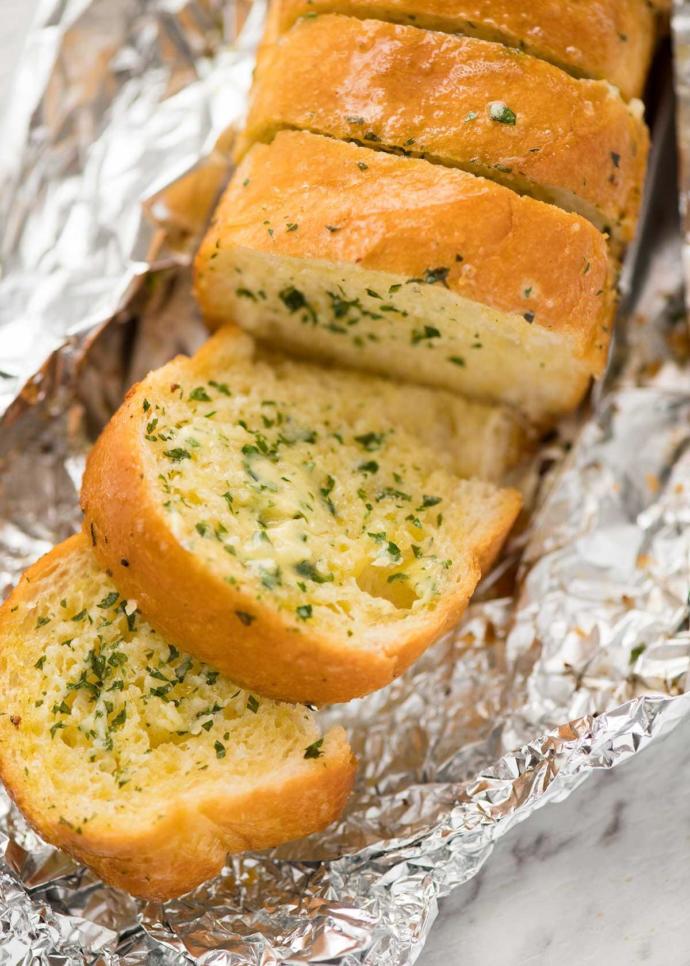 Who invented garlic bread?