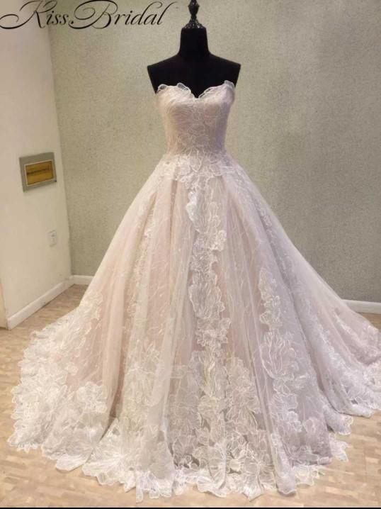 Out of the three blush colored wedding dresses, which looks prettiest to you??
