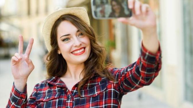 Why do people seem to be obsessed with taking selfies?